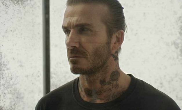 Former British soccer player David Beckham stands in a glass box warmed by mosquitoes as part of a short film by Malaria No More UK released on Feb. 7, 2018, to promote the elimination of the infectious disease. Malaria No More UK/Handout via THOMSON REUT