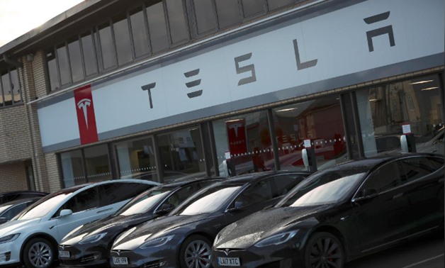 A Tesla dealership is seen in West Drayton, just outside London, Britain, February 7, 2018. REUTERS/Hannah McKay
