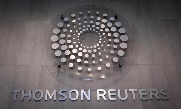 The Thomson Reuters logo is seen inside the lobby of the company building in Times Square, New York October 29, 2013. REUTERS/Carlo Allegri
