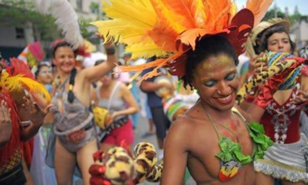 RIO DE JAMEIRO, Brail — Revellers take part in a “bloco” or street party in the run up to Rio's carnival, in Rio de Janeiro, Brazil on February 4, 2018 - AFP 