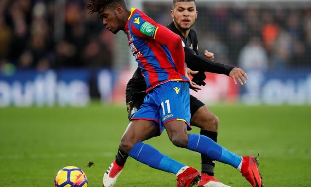 Soccer Football - Premier League - Crystal Palace vs Newcastle United - Selhurst Park, London, Britain - February 4, 2018 Crystal Palace's Wilfried Zaha in action with Newcastle United's DeAndre Yedlin REUTERS/David Klein
