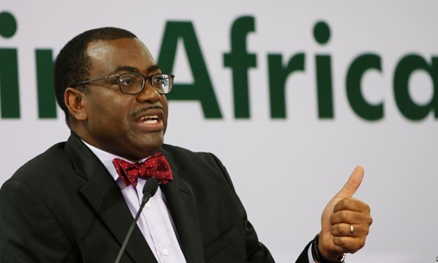FILE - African Development Bank (AfDB) President Akinwumi Adesina gestures as he addresses a news conference at the annual meeting of AfDB in Gandhinagar, India, May 22, 2017 - Reuters