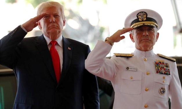 FILE PHOTO: U.S. President Donald Trump is welcomed by U.S. Navy Admiral Harry Harris, commander of United States Pacific Command, at its headquarters in Aiea, Hawaii, U.S. November 3, 2017. REUTERS/Jonathan Ernst