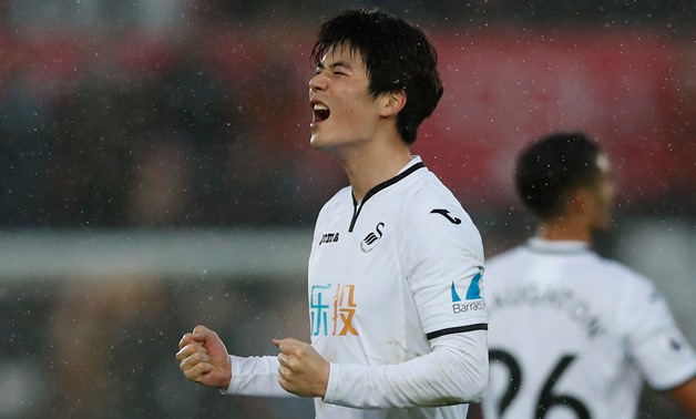 Soccer Football - Premier League - Swansea City vs Burnley - Liberty Stadium, Swansea, Britain - February 10, 2018 Swansea City's Ki Sung Yueng celebrates after the match Action Images via Reuters/Andrew Boyers 