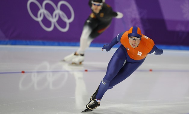 Speed Skating – Pyeongchang 2018 Winter Olympics – Men’s 5000m competition finals – Gangneung Oval - Gangneung, South Korea – February 11, 2018 - Sven Kramer of the Netherlands and Patrick Beckert of Germany compete. REUTERS/Phil Noble
