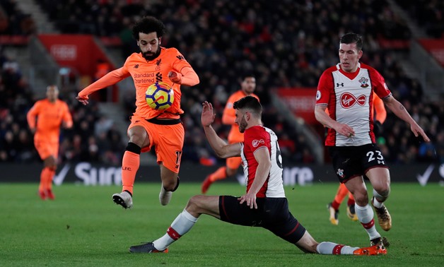 Soccer Football - Premier League - Southampton vs Liverpool - St Mary's Stadium, Southampton, Britain - February 11, 2018 Liverpool's Mohamed Salah in action with Southampton's Wesley Hoedt Action Images via Reuters/Peter