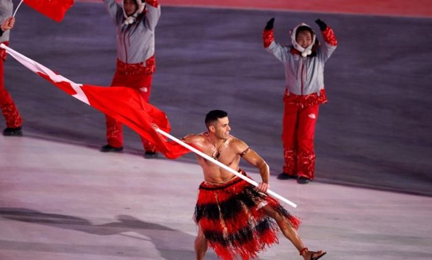 FILE PHOTO - Pyeongchang 2018 Winter Olympics – Opening Ceremony – Pyeongchang Olympic Stadium- Pyeongchang, South Korea – February 9, 2018 - Pita Taufatofua of Tonga carries the national flag during the opening ceremony. REUTERS/Phil Noble