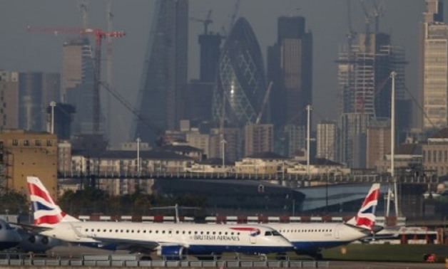 London City Airport was closed on Monday after a World War II bomb was found in the neighbouring dock - AFP