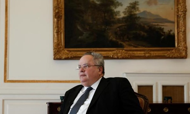 FILE PHOTO - Greek Foreign Minister Nikos Kotzias speaks during an interview with Reuters at the Foreign Ministry in Athens, Greece, January 31, 2018.
