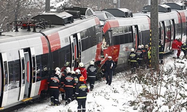 Two packed commuter trains collided head-on in Monday morning rush-hour traffic in the Austrian capital Vienna, leaving five people seriously hurt, emergency services said. - AFP