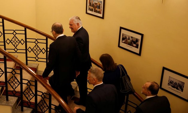 U.S. Secretary of State Rex Tillerson and Jordanian Foreign Minister Ayman Safadi arrive for a meeting in Amman, Jordan February 14, 2018. REUTERS/Muhammad Hamed