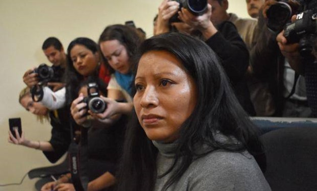 Teodora Vasquez (C) is pictured shortly before her release after serving 11 years of a 30 year prison sentence for receiving an abortion - AFP
