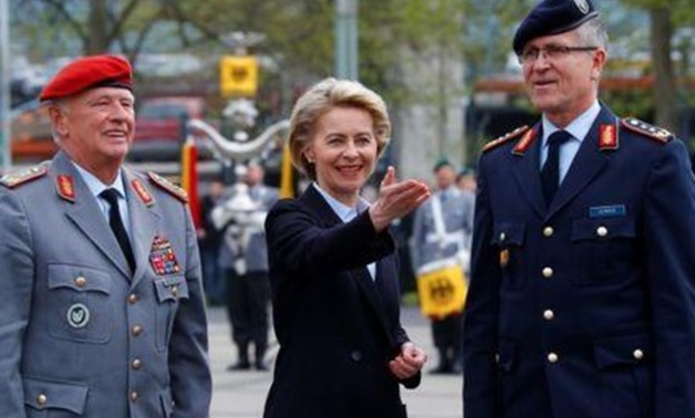 FILE PHOTO - German defence minister Ursula von der Leyen is flanked by Ludwig Leinhos (R), new commander lieutenant general of Germany's Cyber and Information Space command CIR and Volker Wieker, inspector general of Germany's armed forces Bundeswehr in 