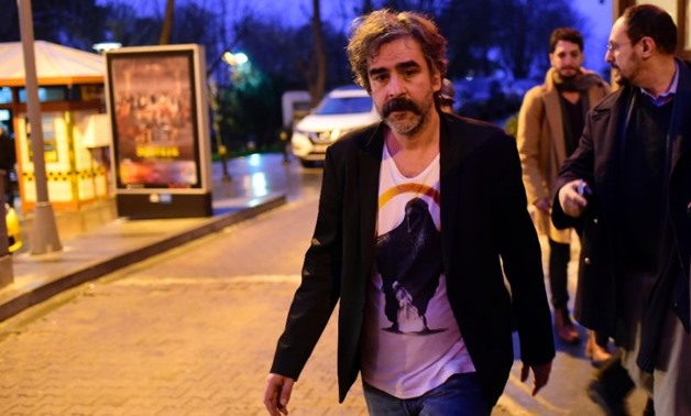 Deniz Yucel, a reporter with Germany's Die Welt newspaper, returned to his home in Istanbul after spending a year in jail - AFP
