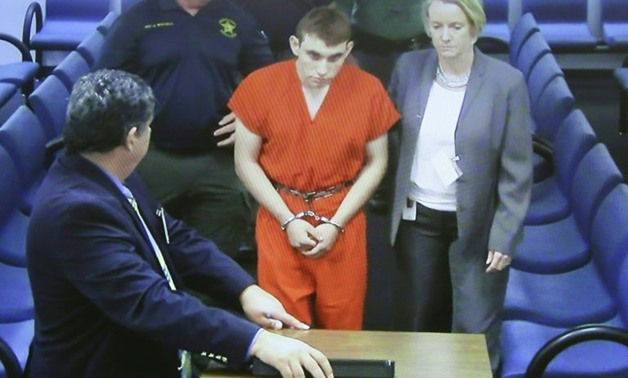 The FBI says it received a warning in January about high school shooter Nikolas Cruz, seen here in court, but failed to take action - AFP 
