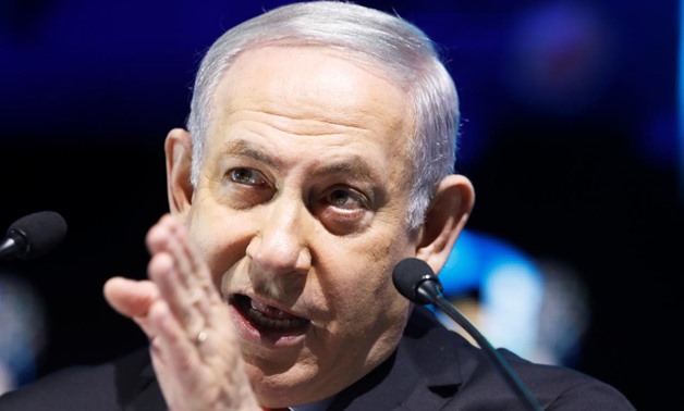 Israeli Prime Minister Benjamin Netanyahu speaks during the Muni World 2018 conference in Tel Aviv, Israel February 14, 2018. REUTERS/Nir Elias

