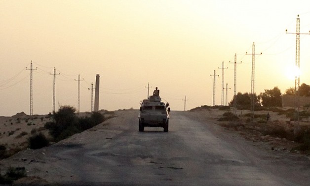 A military vehicle drives through northern Sinai. (Asmaa Waguih/Reuters)