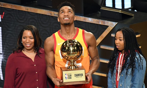 Feb 17, 2018; Los Angeles, CA, USA; Utah Jazz guard Donovan Mitchell (45) holds the trophy after winning the dunk contest during the 2018 All Star Saturday Night at Staples Center. Mandatory Credit: Richard Mackson-USA TODAY Sports
