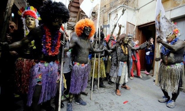 Lebanese take part in the Zambo carnival held in the northern city of Tripoli to mark the last period of excess on the eve of Orthodox Christian period of Lent
