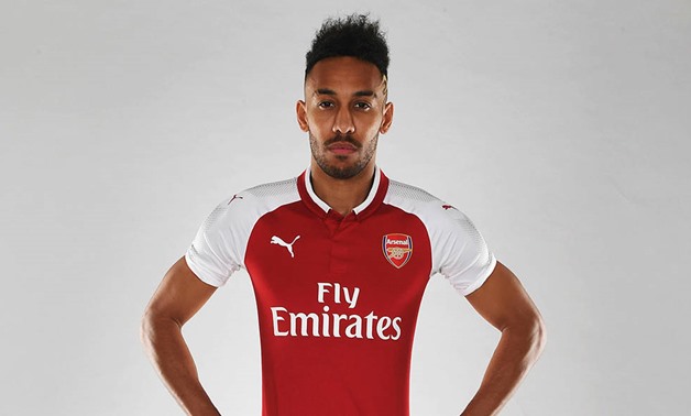 Pierre-Emerick Aubameyang with Arsenal shirt – Press image courtesy of Arsenal’s official website