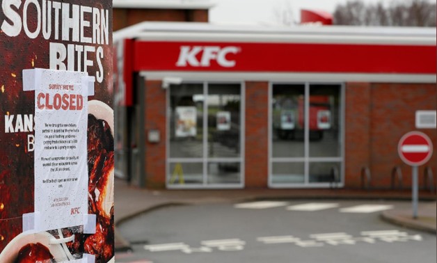  A closed sign hangs on the drive through of a KFC restaurant after problems with a new distribution in Britian/ Reuters, Darren Staples