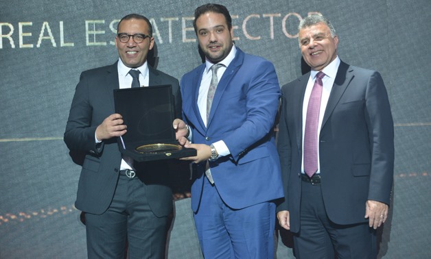 Mohamed Mohamed Farid Khamis receiving BT100 award – Egypt Today