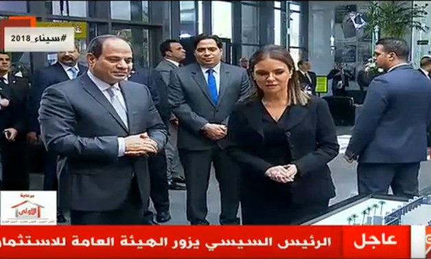 TV Screenshot President Abdel Fatah el-Sisi at the inauguration ceremony with Minister of Investment  and International Cooperation Sahar Nasr on February 21, 2018.