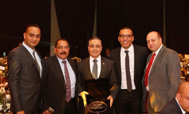 Mohamed Galal, executive manager; Hani Fekry, Manager of Contracting, Walid Elbansly, the finance manager, Yasser Kamal, the Public relations Manger of UCP were awarded at BT100 cermony - Egypt Today