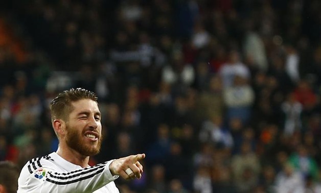 Real Madrid's Sergio Ramos celebrates his goal against Rayo Vallecano during their Spanish first division soccer match at Santiago Bernabeu stadium in Madrid November 8, 2014. REUTERS/Andrea Comas 