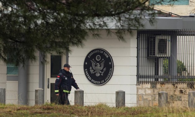 A policeman patrols in front of the United States embassy building in Podgorica, Montenegro, February 22, 2018. REUTERS/Stevo Vasiljevic