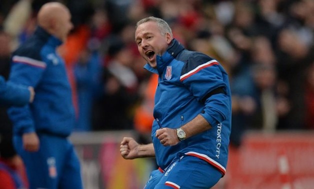 Stoke City manager Paul Lambert celebrates their second goal. REUTERS/Peter Powell
