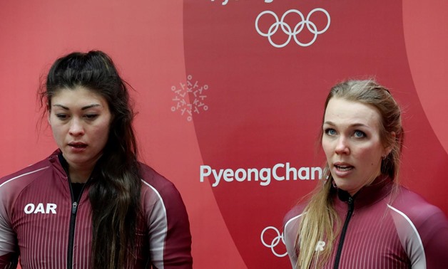 South Korea - February 21, 2018 - Olympic athletes from Russia Nadezhda Sergeeva and Anastasia Kocherzhova react. REUTERS/Arnd Wiegmann. “
