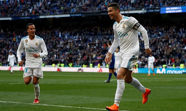 MADRID, Feb 24 (Reuters) - Real Madrid's 'BBC' strikeforce hit back with a vengeance when Cristiano Ronaldo, Gareth Bale and Karim Benzema all scored in a 4-0 win over Alaves on Saturday as the champions moved within four points of second-placed Atletico 