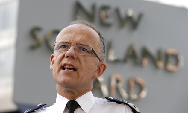 FILE PHOTO: The then assistant Commissioner of the Metropolitan Police, Mark Rowley answers journalists questions after reading a statement regarding the latest security arrangements in Britain following attacks in Tunisia and France, outside New Scotland
