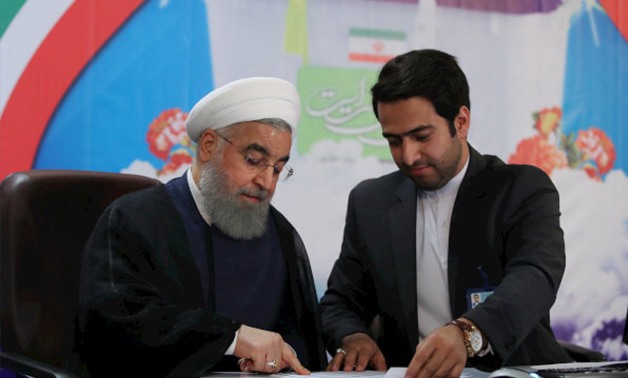 Iranian President Hassan Rouhani register for Iran elections- Photo via Reuters