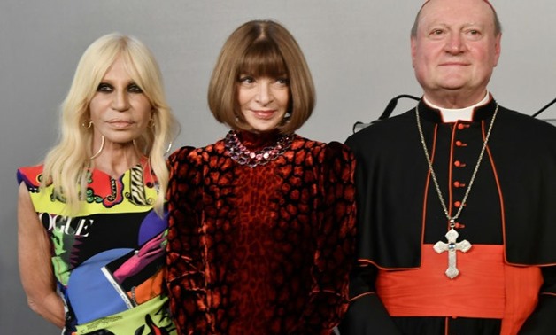 Italian designer Donatella Versace, editor-in-chief of Vogue Anna Wintour and cardinal Gianfranco Ravasi, President of the Vatican Pontifical Council for Culture, attended an announcement in Rome about the exhibition - AFP / Tiziana FABI