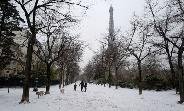 Paris awoke under a blanket of snow - AFP 
