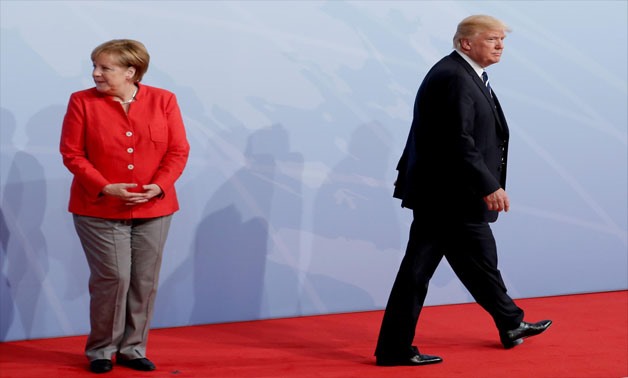 German Chancellor Angela Merkel welcomes U.S. President Donald Trump to the opening day of the G20 leaders summit in Hamburg, Germany, July 7, 2017 -
 REUTERS/Ian Langsdon/Pool/File Photo