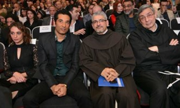 Amr Saad along with Pope Botrus Danial in the Egyptian Catholic Center Cinema Festival closing ceremony – Egypt Today