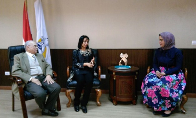 Rania Fahmy (right) with officials from the National Council for Women - Press photo