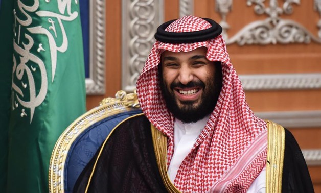 In this file photo taken in November 2017, Saudi crown prince Mohammed bin Salman is een attending a meeting with Lebanon's Christian Maronite patriarch, in Riyadh. Saudi Arabia's crown prince lands in Egypt on March 3, 2018, on the first leg of his maide