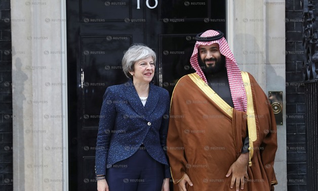 Britain's Prime Minister Theresa May greets the Crown Prince of Saudi Arabia Mohammad bin Salman outside 10 Downing Street in London, March 7, 2018. REUTERS/Simon Dawson
