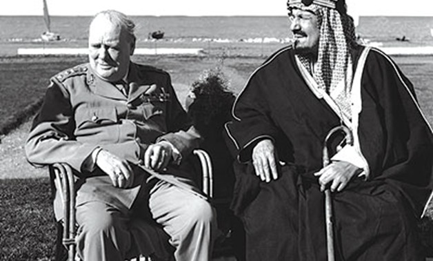 FILE – King Abdulaziz Al-Saud meets with Winston Churchill in Egypt’s Fayoum, February, 1945
