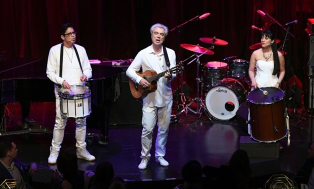 David Byrne, seen here peforming with George Salazar in New York May 11, 2017, says he wanted to offer a sense of optimism in is first album in six years, "American Utopia,"