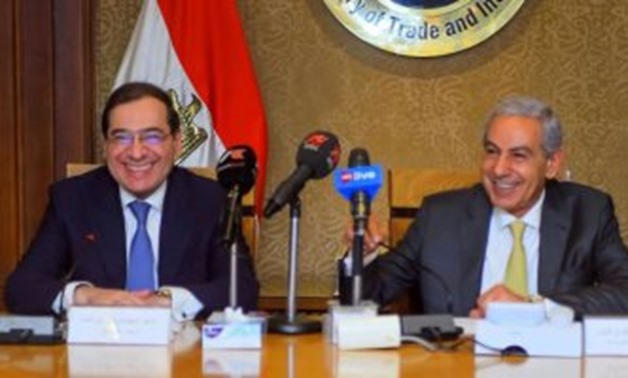  FILE - Minister of Petroleum Tarek el-Molla with Minister of Trade Tarek Kabil