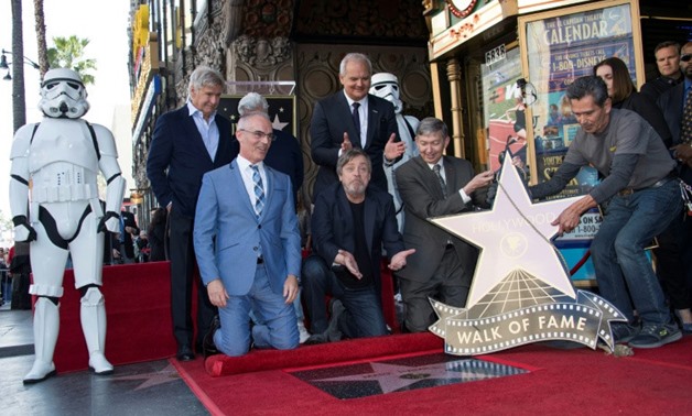 Harrison Ford (top L), George Lucas (top C), Mark Hamill (bottom C), and Hollywood Chamber of Commerce, President/CEO Leron Gubler (bottom R), and guests attend as Mark Hamill is honored with a star on the Hollywood Walk of Fame on March 8, 2018