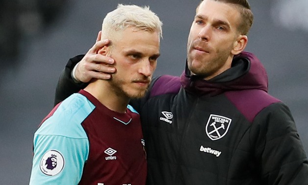 Soccer Football - Premier League - West Ham United vs Burnley - London Stadium, London, Britain - March 10, 2018 West Ham United's Adrian and Marko Arnautovic look dejected after the match REUTERS/David Klein