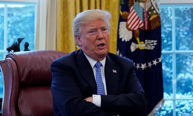 President Donald Trump speaks during an interview with Reuters at the White House in Washington.
