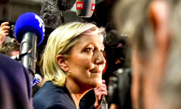 National Front Leader Marine Le Pen is out to revive a party battered by last year's failures in presidential and legislative elections with one proposal to ditch the tainted FN brand, seen as a key hurdle to winning power
