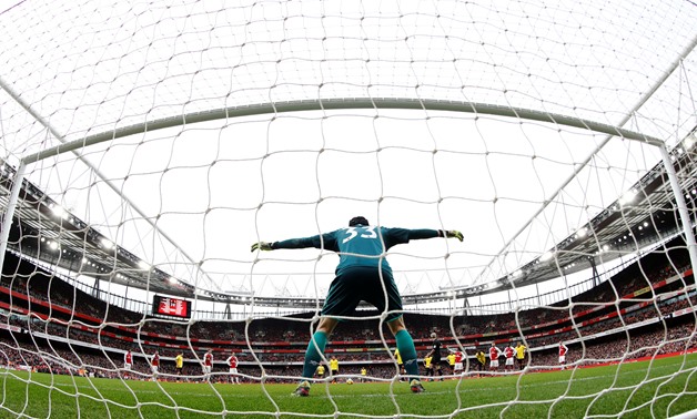 Soccer Football - Premier League - Arsenal vs Watford - Emirates Stadium, London, Britain - March 11, 2018 Arsenal's Petr Cech before saving a penalty from Watford's Troy Deeney REUTERS/Eddie Keogh